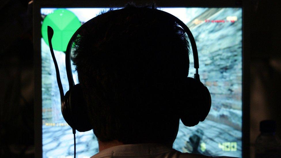 Gamer during e-sports with headset on