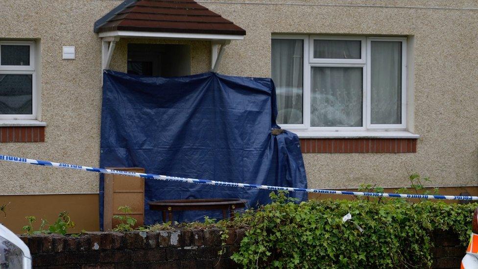 the property where the 66-year-old's body was discovered