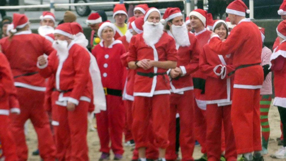 Group dressed as Santa