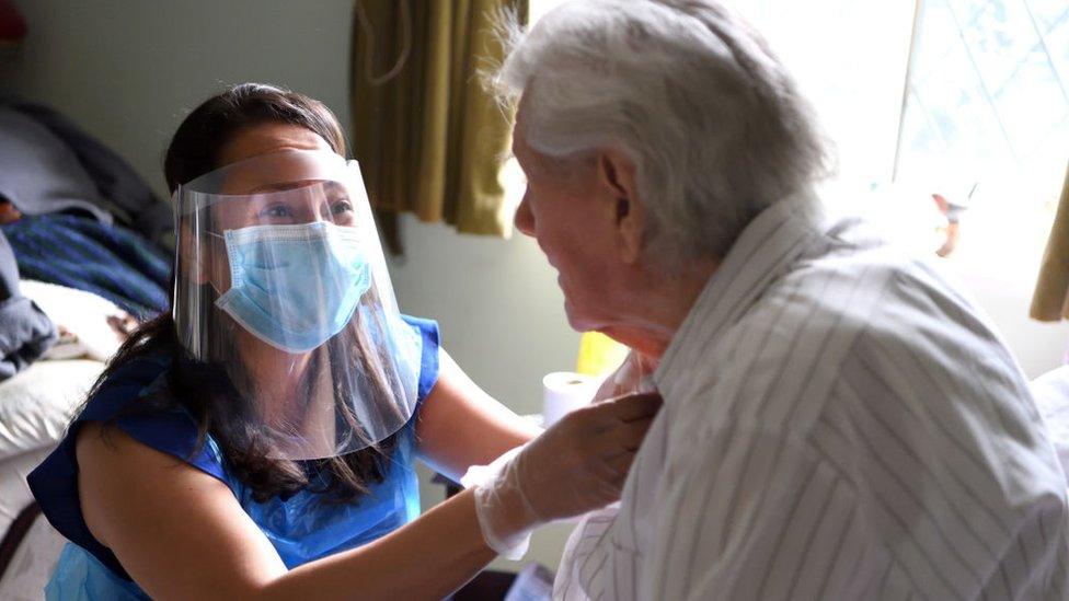 Picture of an elderly patient being looked after