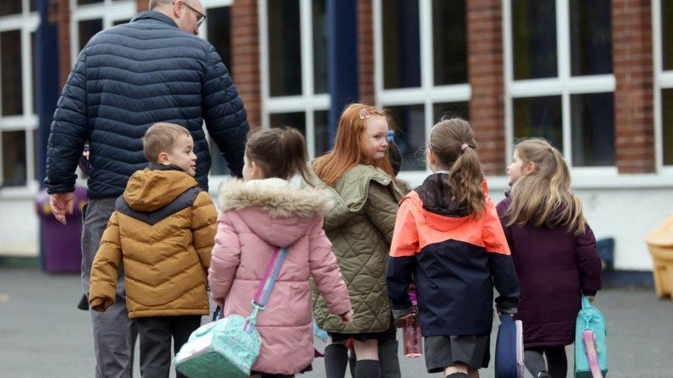 Children arriving back to school at Braniel Primary school in Belfast