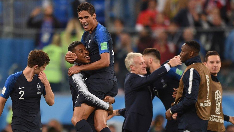 The French side celebrate together after the match