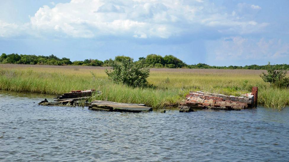 The final tombs sliding slowly into Bayou Lafourche