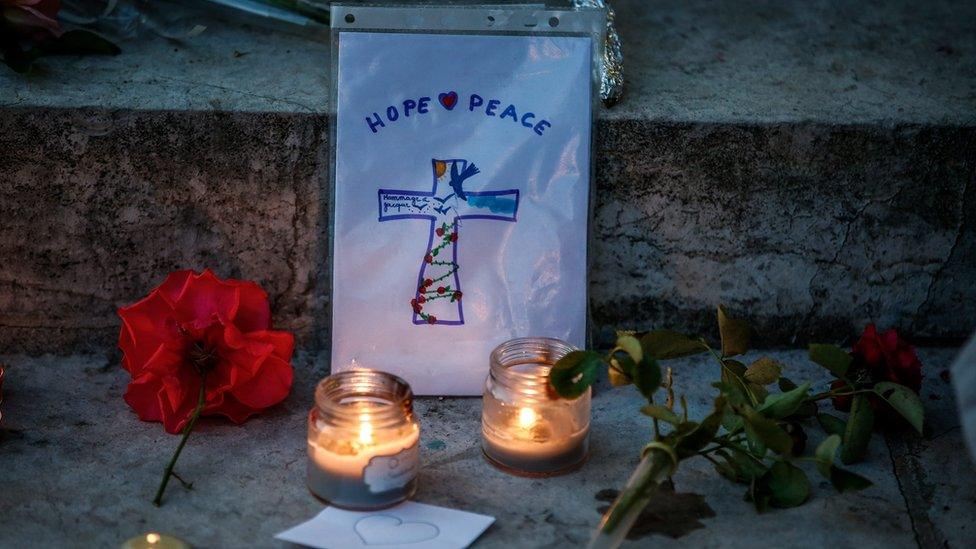 Flowers and tributes in Saint-Etienne-du-Rouvray after a priest was killed with a knife