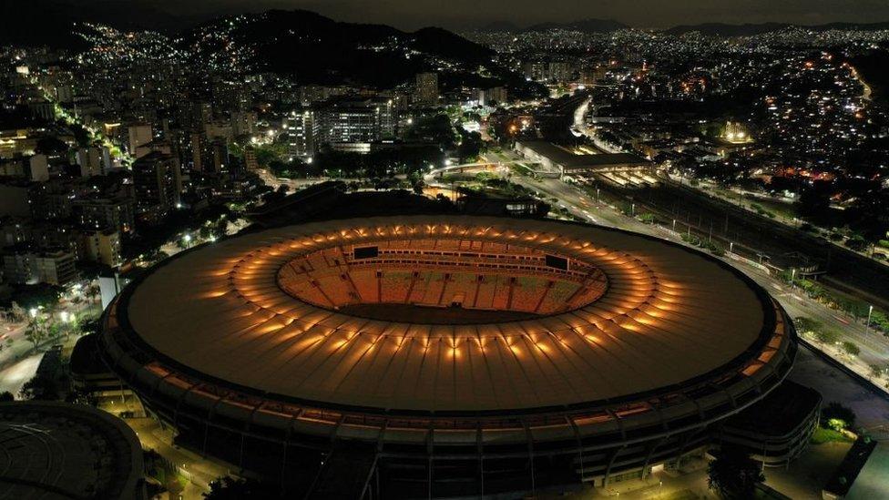 Maracanã stadium in Rio de Janeiro lit up in gold in honour of Pelé