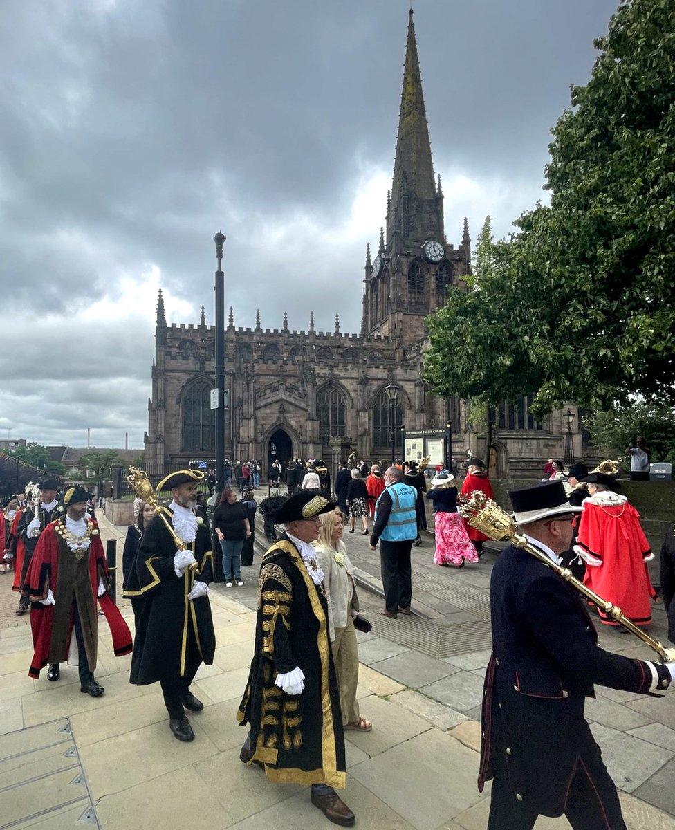 Lord Mayors parading with Rotherham Minster in the background