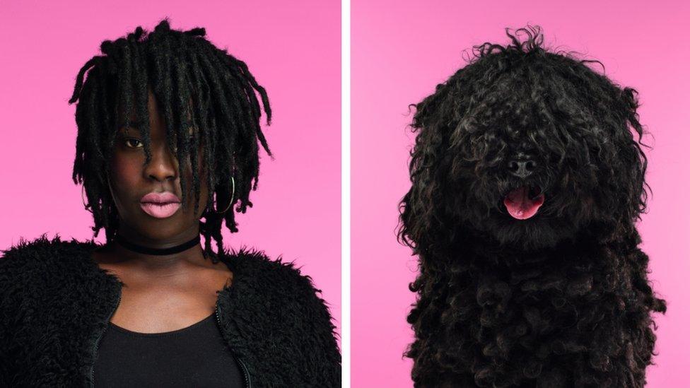 A woman with pale pink lipstick and dark black dreadlocks dramatically stares forward next to a picture of a dog with dark curly hair and a bright pink tongue.