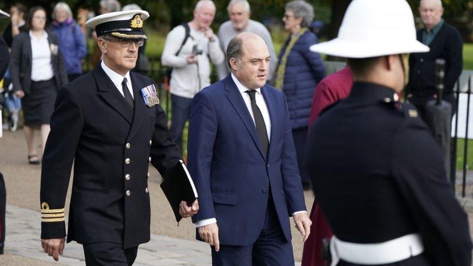 Secretary of State for Defence Ben Wallace (centre) arrives for the funeral of Major General Matthew Holmes