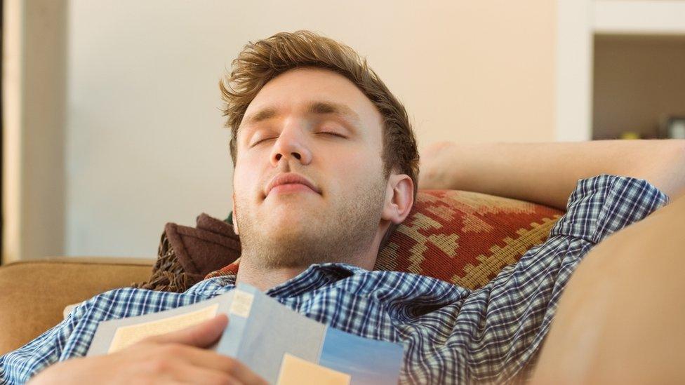 Napping man on the sofa