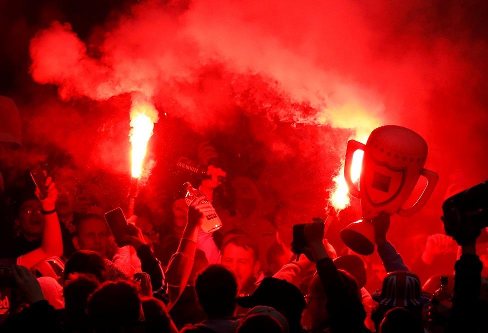 Fans celebrate at Ibrox