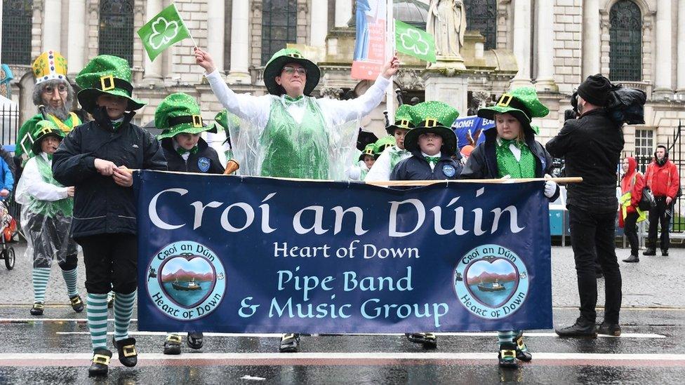 The rain lashed on little leprechauns at the Belfast parade