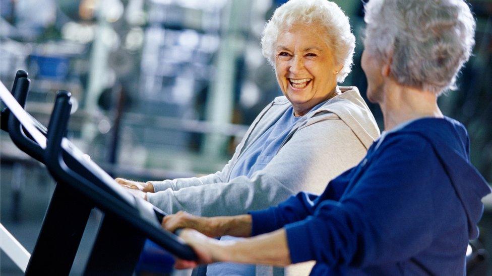 Two senior women exercising