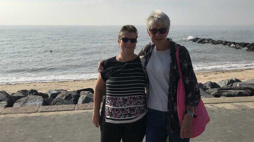 Two women at the seafront