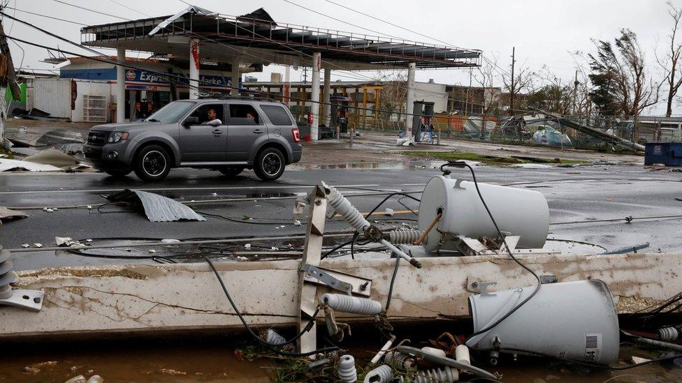 Damaged electrical installations after the area was hit by Hurricane Maria in Guayama, Puerto Rico, September 20, 2017