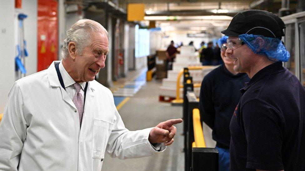 King Charles speaks to staff on the cornflakes production line