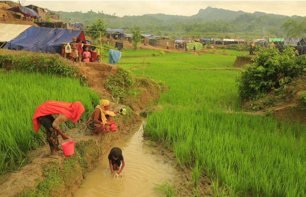 Makeshift tents and tarpaulins provide a fragile shelter for the newcomers