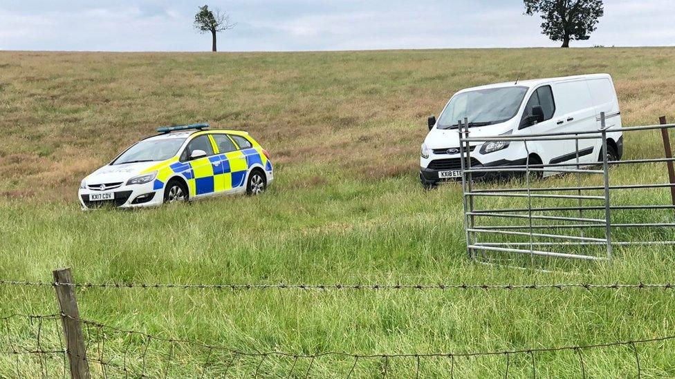 Police car and van