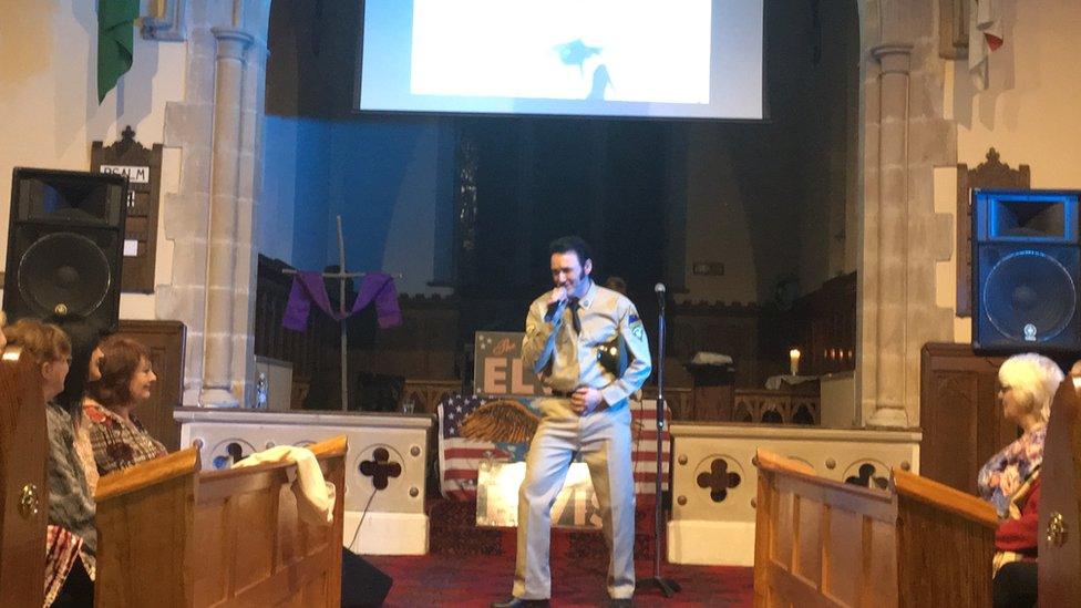 The church invited Elvis impersonator Andy Rogers to lead the service through the music of 'The King'