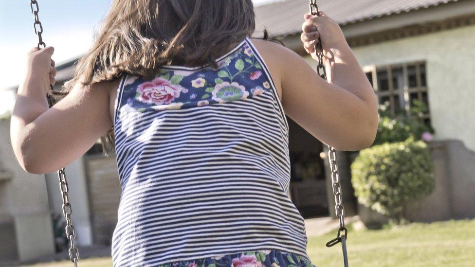 Girl on a swing