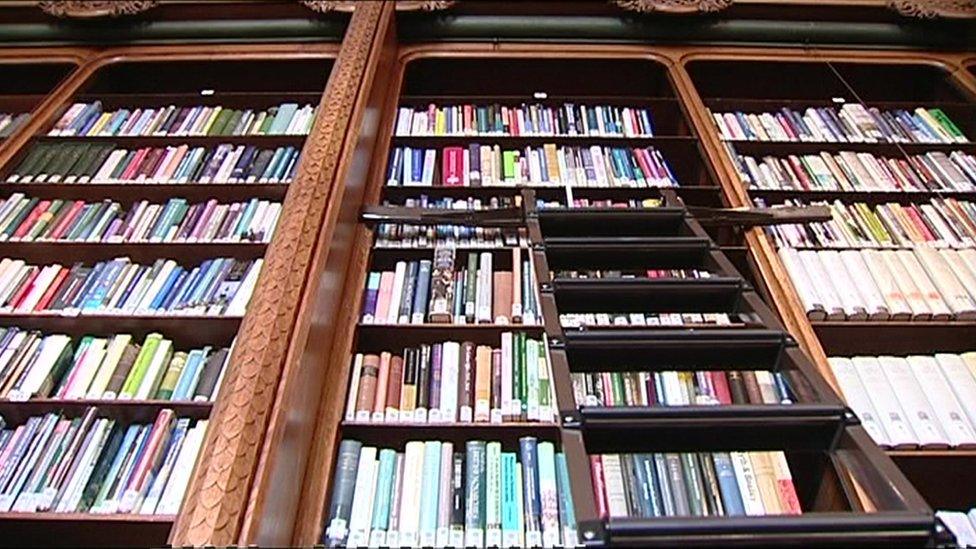 Shot from below of library shelves