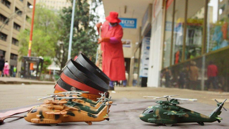 Toy helicopters are sold in the central business district (CBD) of the Zimbabwean capital Harare on November 16, 2017