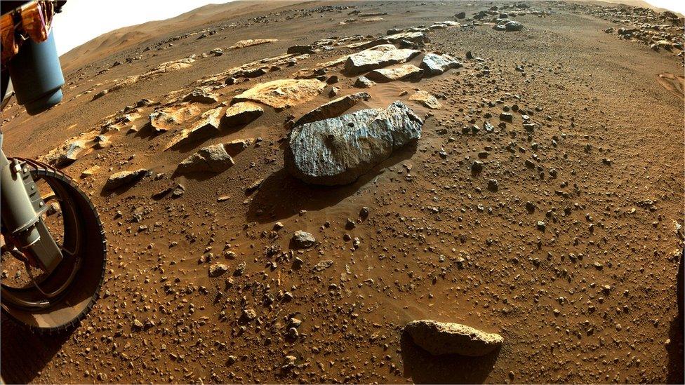 The rock slab known as Rochette with the two drill holes made by the rover