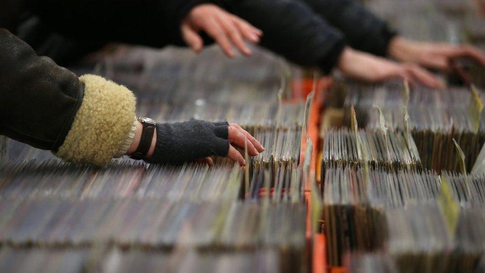 man hand with records