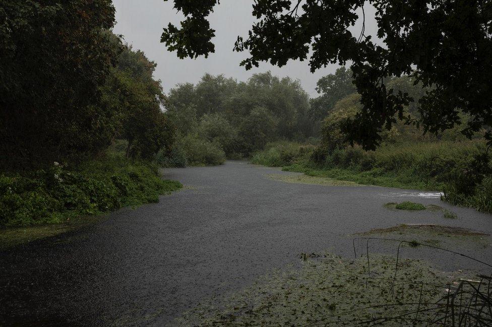 Heavy rain falls on the river Wandle on August 24, 2020