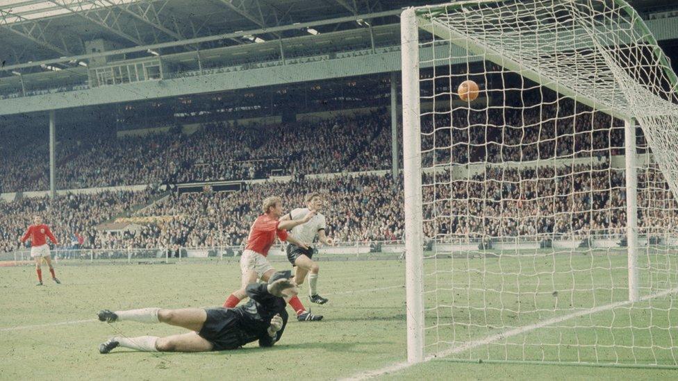 Geoff Hurst scores England's third goal against West Germany in the World Cup Final