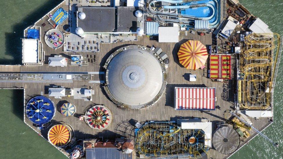 An aerial view of an empty Brighton pier on 22 March