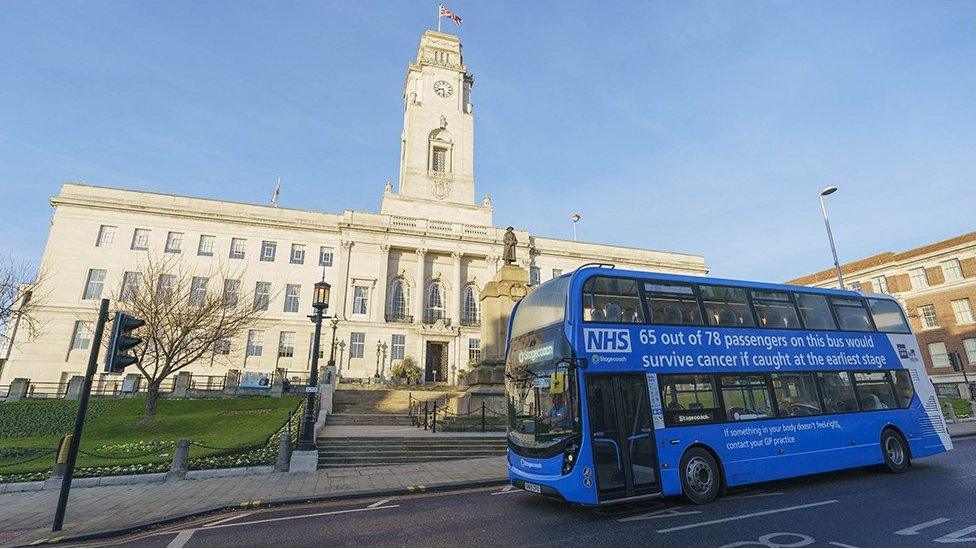 NHS bus outside Barnsley town hall