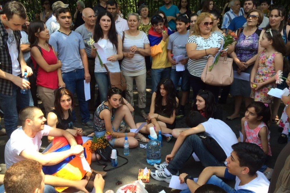 Protester sing in a circle in Yerevan