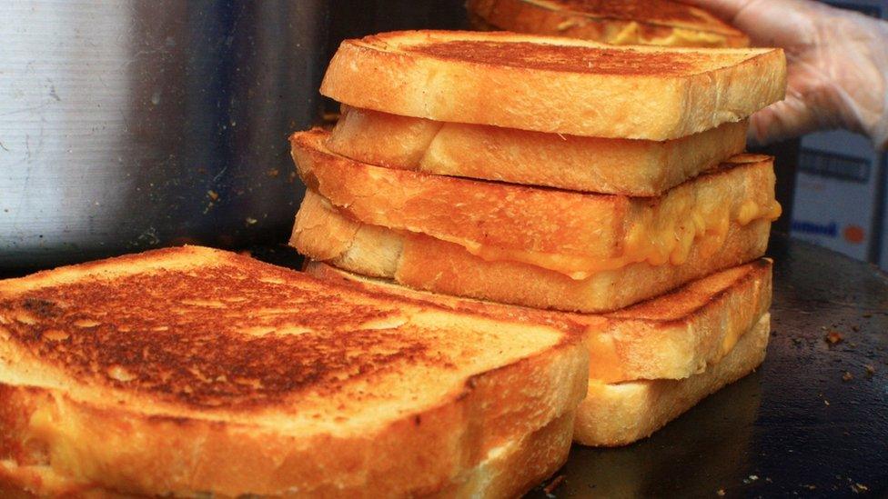 Grilled cheese sandwiches on a griddle