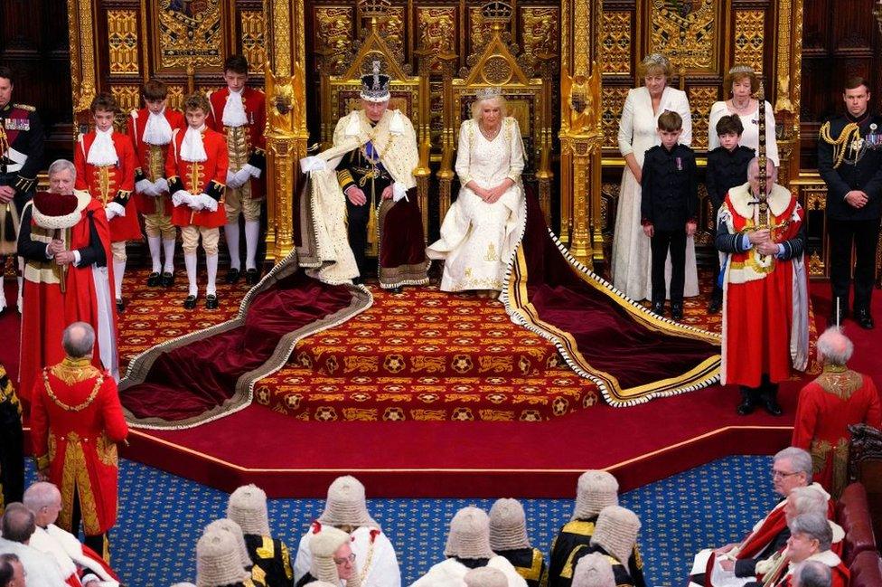 Britain's King Charles III sits beside Queen Camilla during the State Opening of Parliament in the House of Lords Chamber, in London, Britain, November 7, 2023.