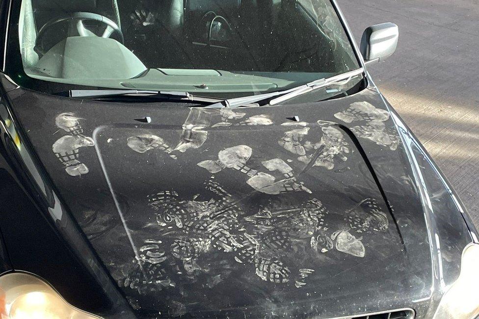 Footprints on car