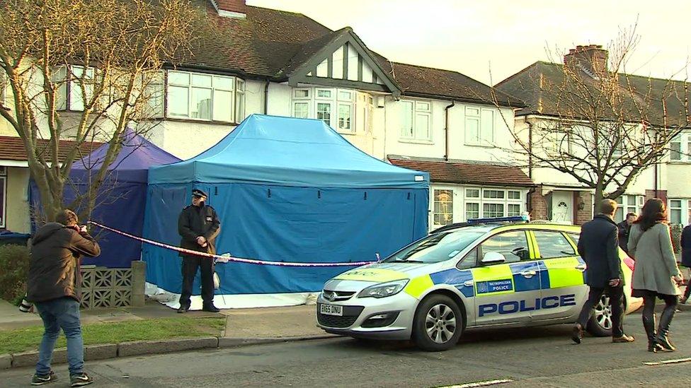 Police working outside the house in New Malden