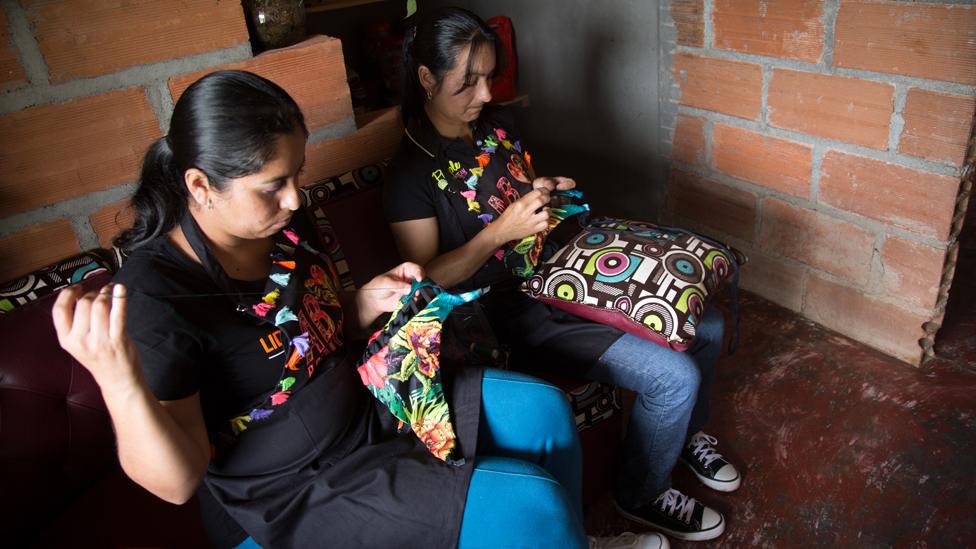 Home workers making Agua Bendita bikinis