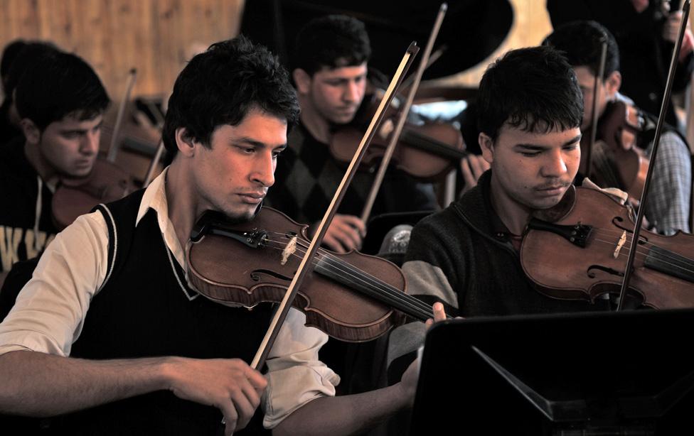 Afghan youths playing the violin at Afghanistan's National Institute for Music in Kabul, 2012