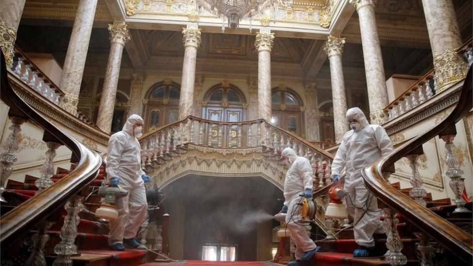 workers disinfect Dolmabahce Palace in Istanbul