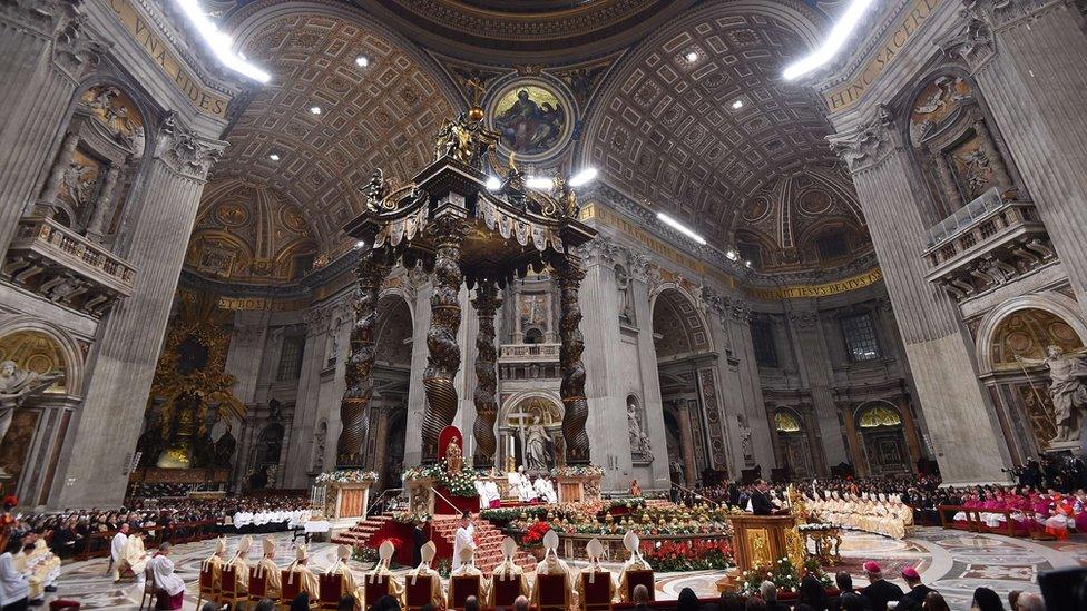 A general view shows Pope Francis celebrating a mass on Christmas eve to mark the birth of Jesus Christ on December 24, 2015 at St Pater's basilica in Vatican