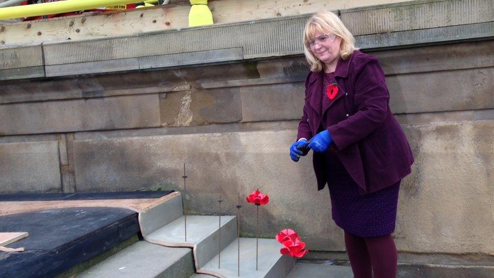 Assistant Mayor Wendy Simon planted the first poppies at the venue