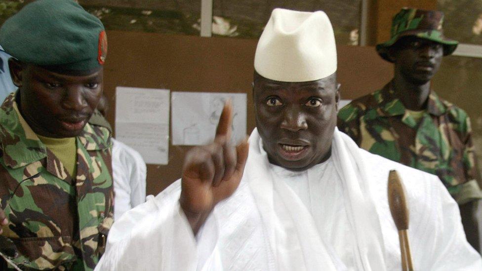 Yahya Jammeh, when president of The Gambia, shows his fingers with ink after casting his vote during the presidential elections 22 September 2006