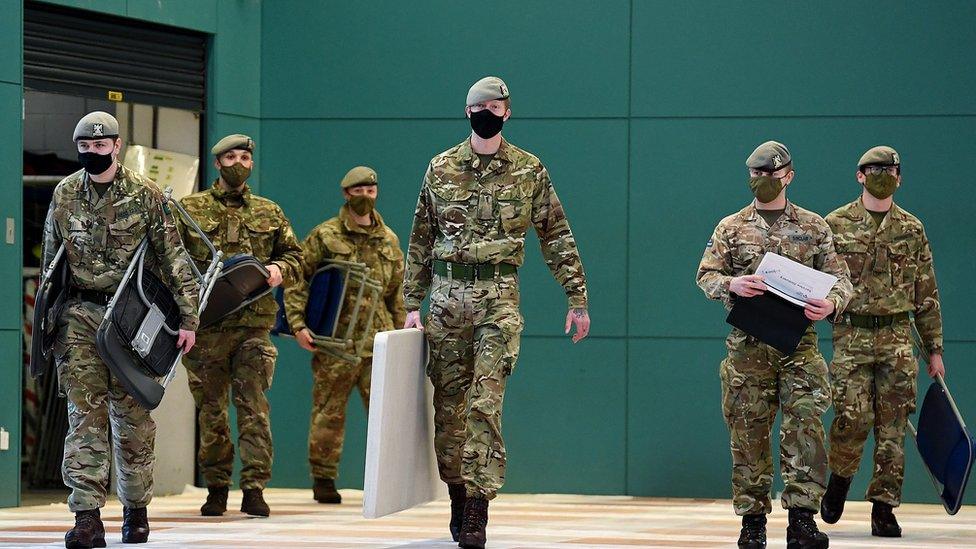 Members of the Royal Scots Dragoon Guard set up a coronavirus vaccination centre at the Donald Dewar Sports Centre, Drumchapel