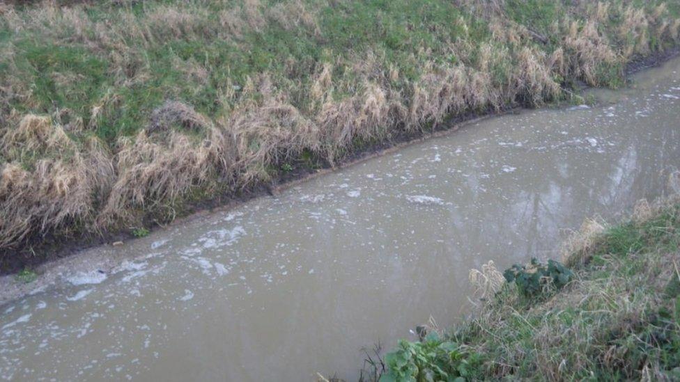 Sewage in river at Yaxley