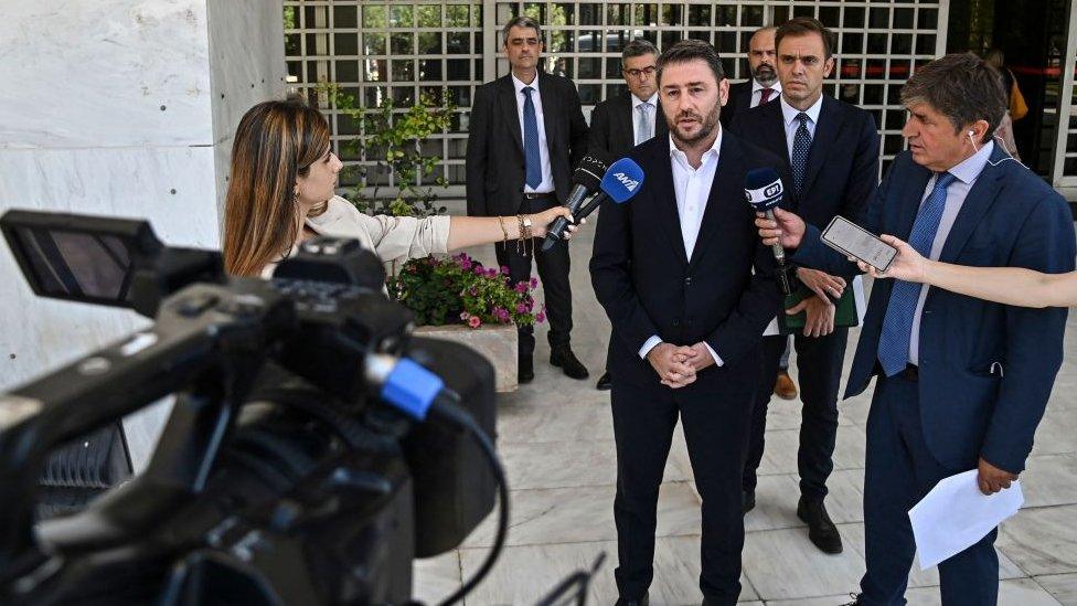 Nikos Androulakis, a member of European Parliament and president of the Movement for Change (Pasok-Kinal) party, talks to media after filing a complaint at the Supreme Court in Athens on 26 July