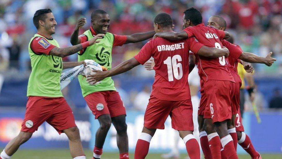 Cuban players hugging