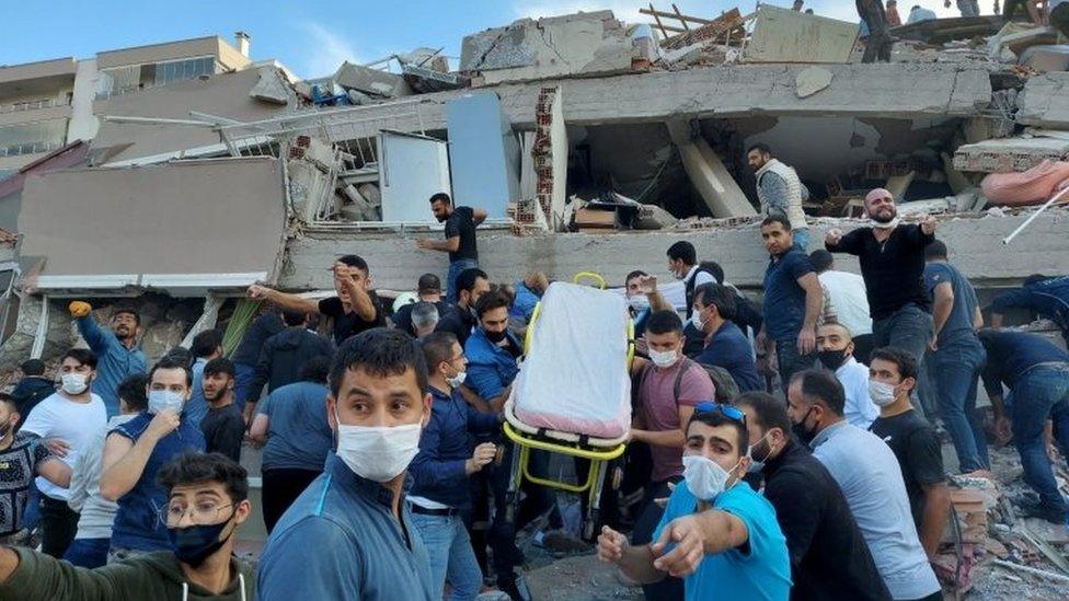 Rescuers and local residents search for survivors after a building collapsed in Izmir, Turkey. Photo: 30 October 2020