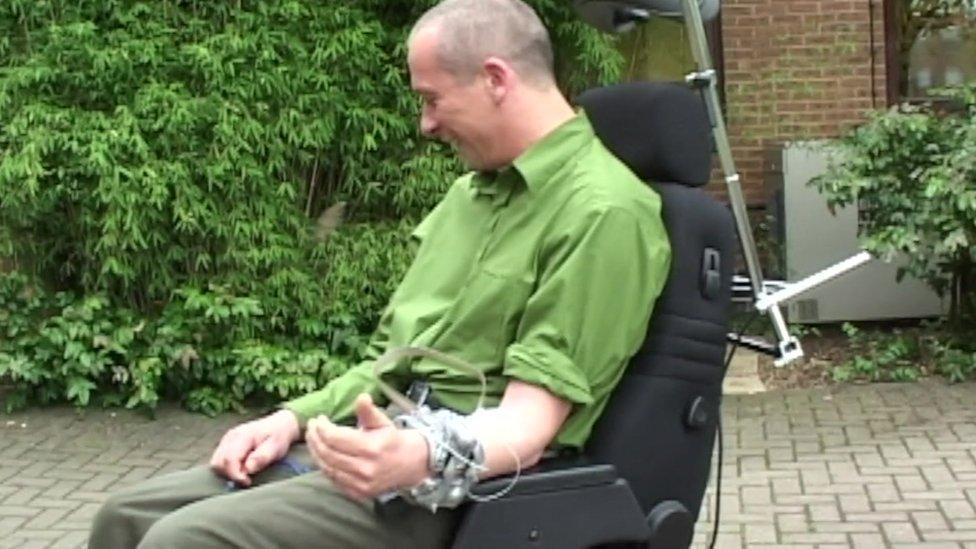 Kevin Warwick controls a robot hand