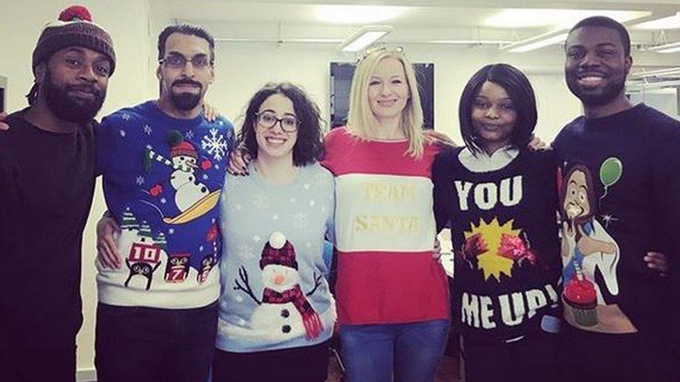 Staff wearing an assortment of Christmas jumpers