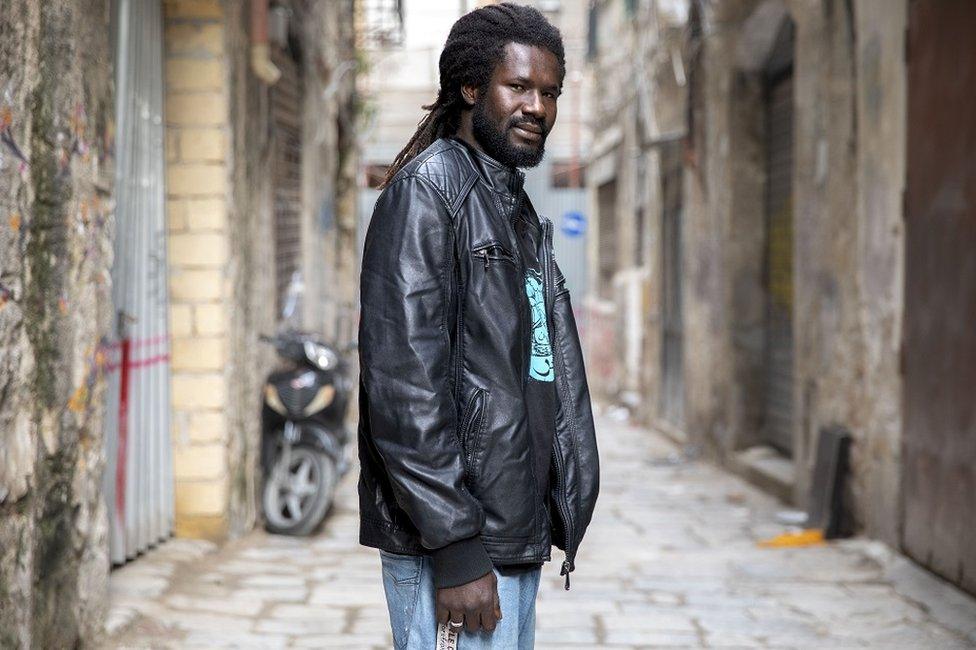 A man standing in a street